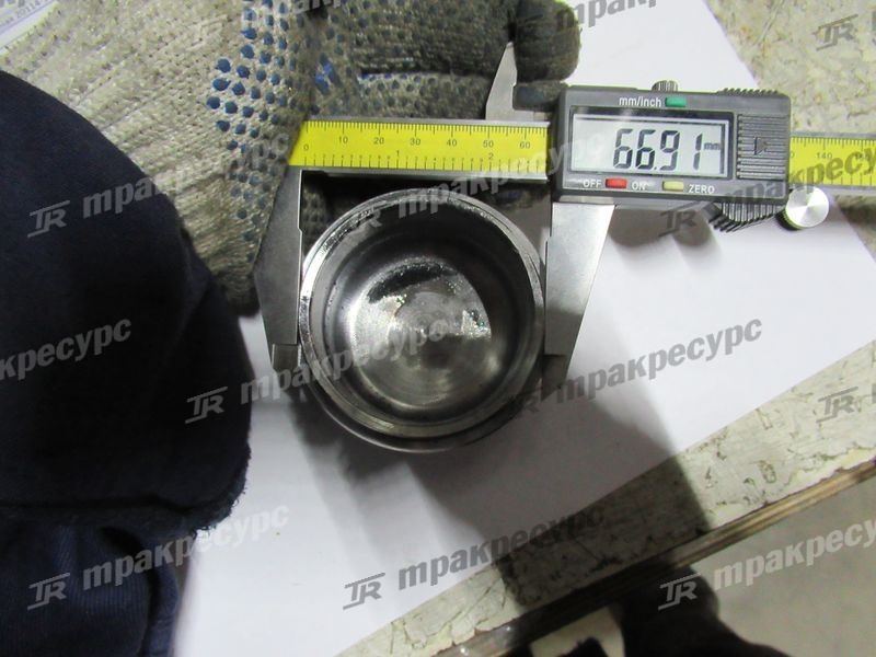 Поршень тормозного цилидра XG932II