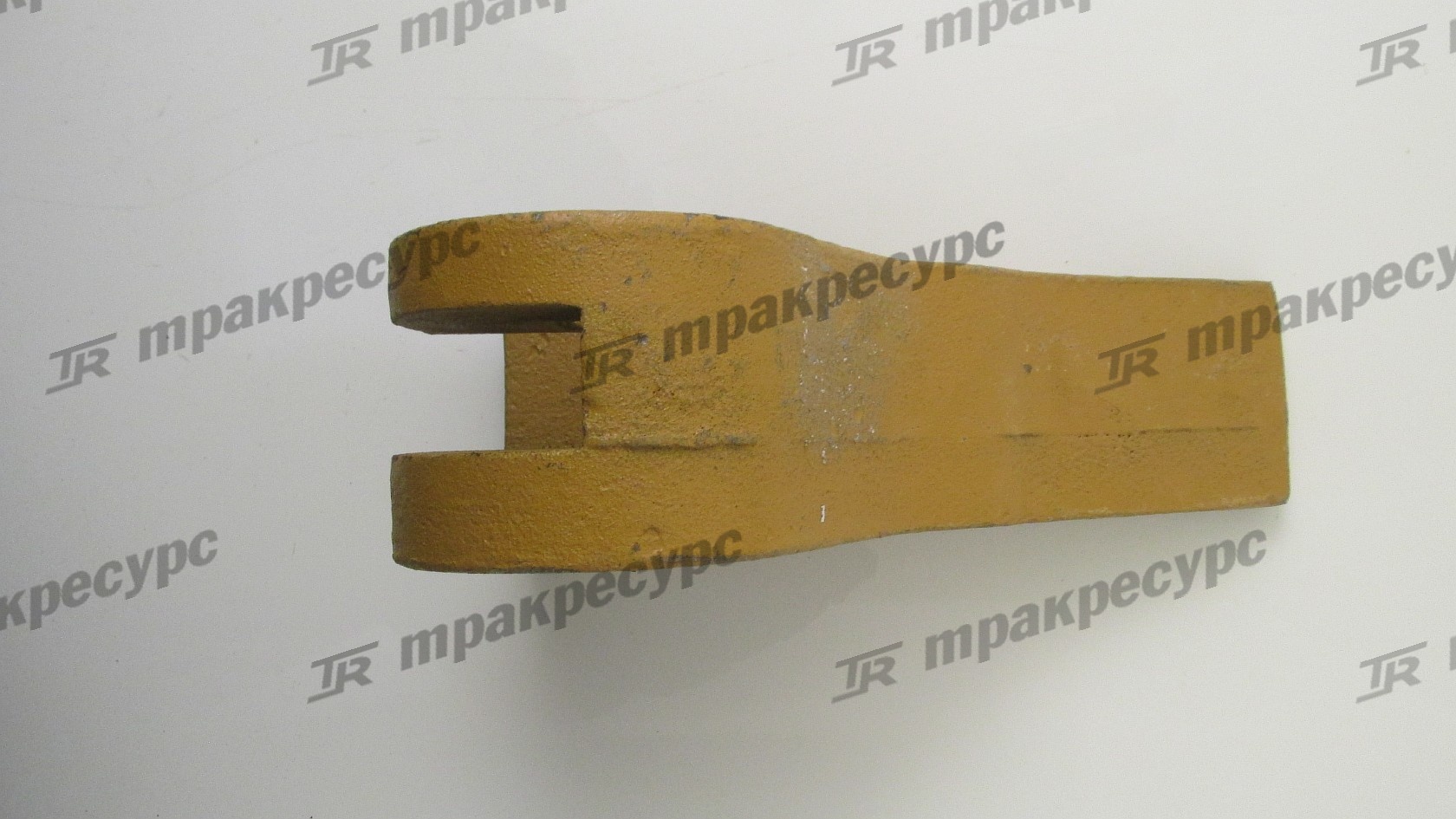 Зуб ковша боковой XG955