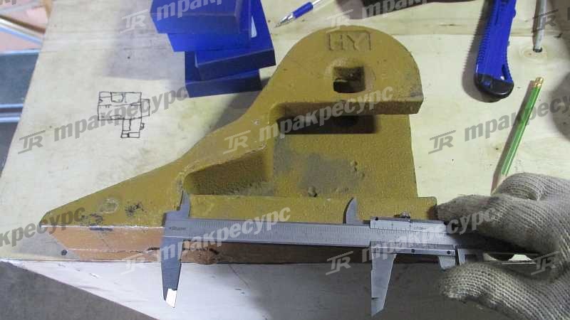 Зуб ковша боковой XG955