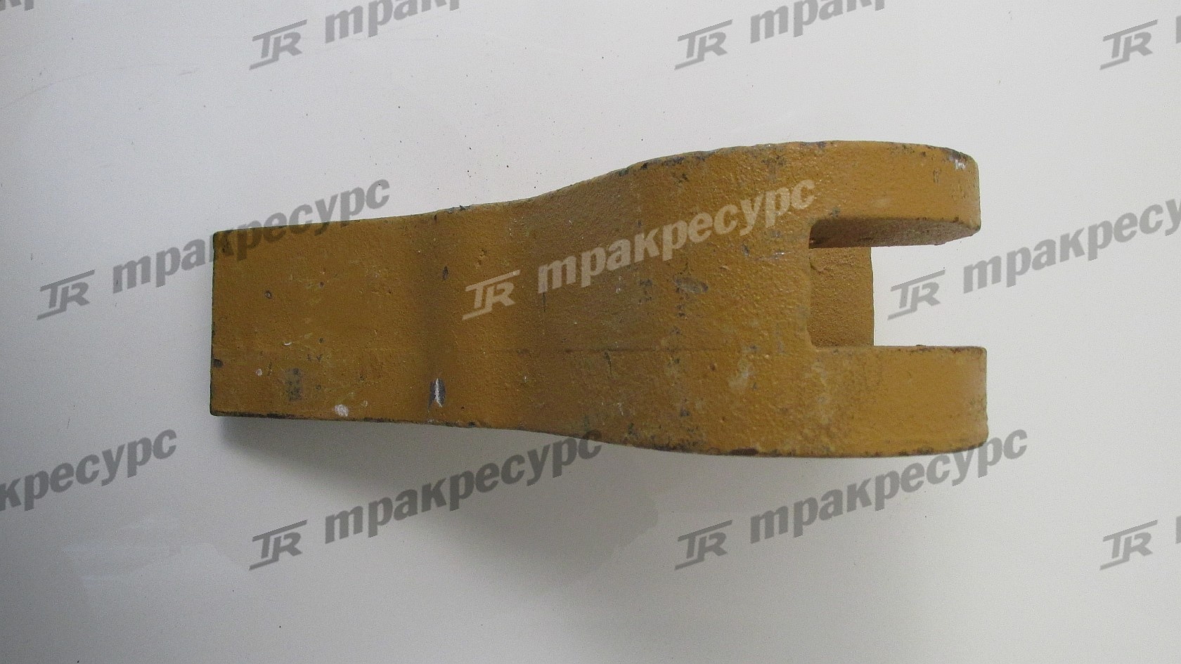 Зуб ковша боковой левый XG955II