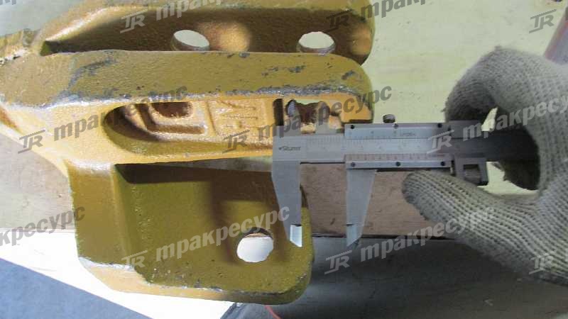 Зуб ковша боковой левый LG952-958