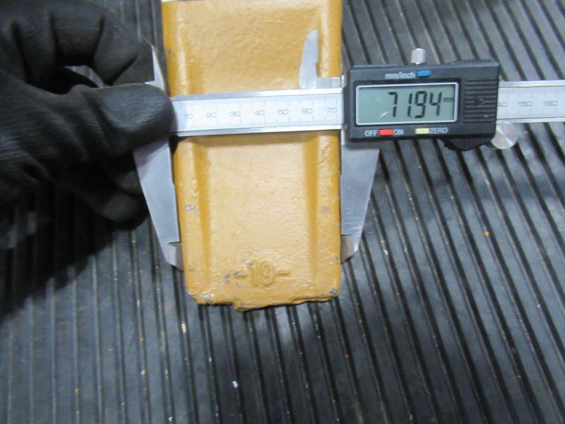 Зуб ковша CDM6150W